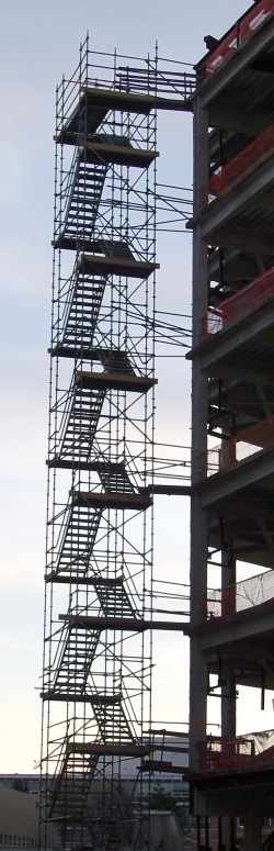 A tall scaffolding staircase.